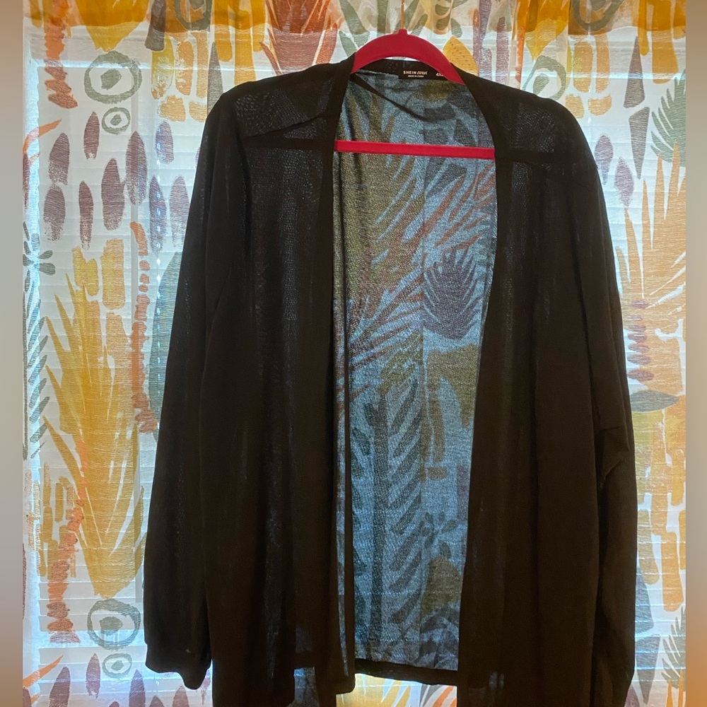 Black long sleeve cardigan.